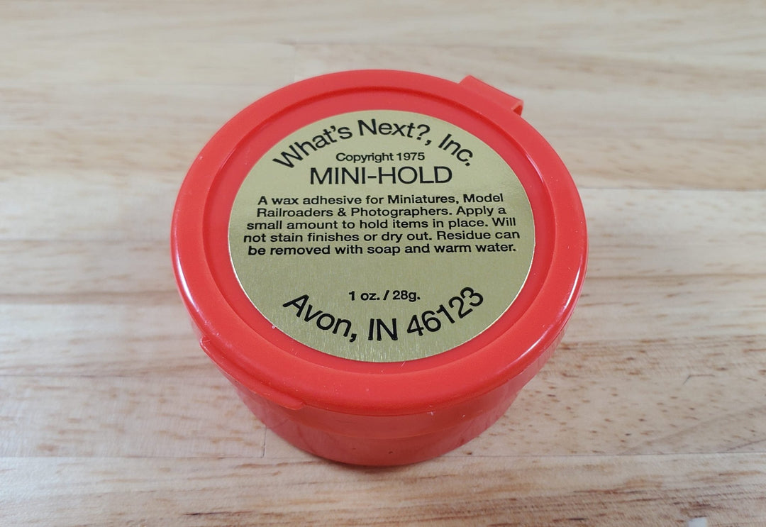 Mini Hold Wax by What's Next Red Jar 1oz Holds Miniatures in Place - MiniatureCrush