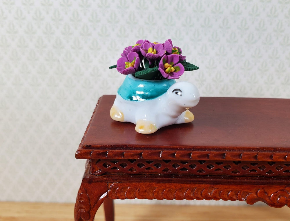 Dollhouse Violet Flowers in a Green Turtle Planter Pot 1:12 Scale Miniature - MiniatureCrush