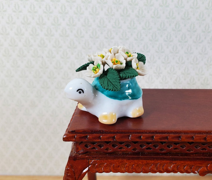 Dollhouse White Flowers in Green Ceramic Turtle Planter Pot 1:12 Scale Miniature - MiniatureCrush
