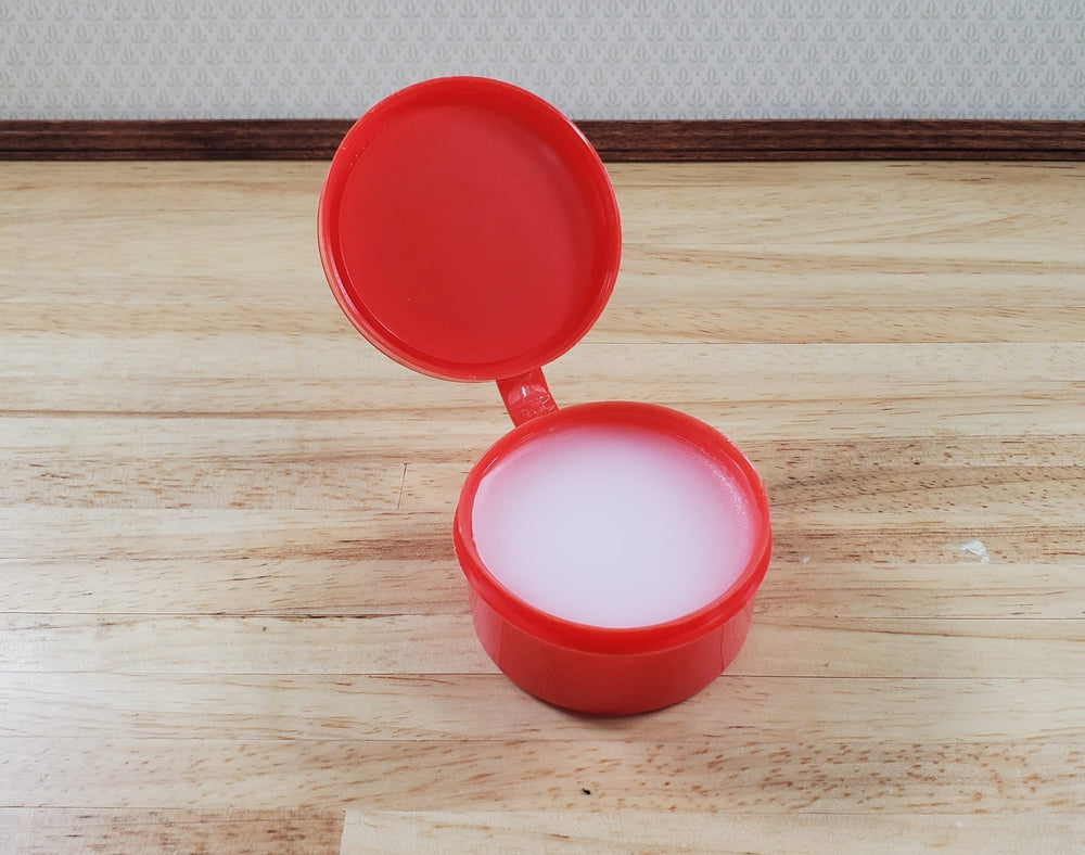Mini Hold Wax by What's Next Red Jar 1oz Holds Miniatures in Place - MiniatureCrush
