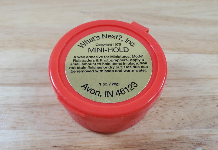 Mini Hold Wax by What's Next Red Jar 1oz Holds Miniatures in Place - MiniatureCrush