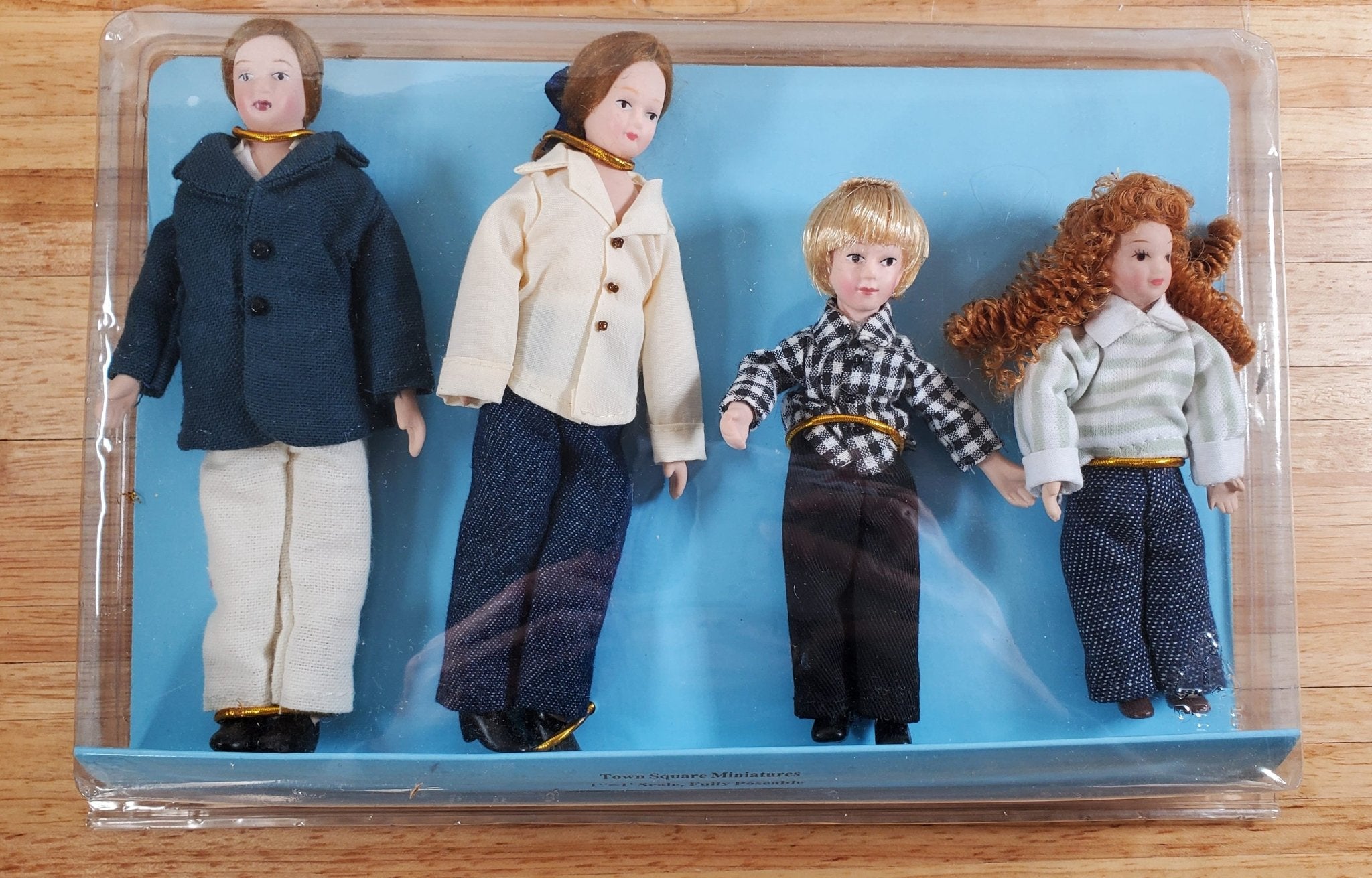 Miniature best sale doll family