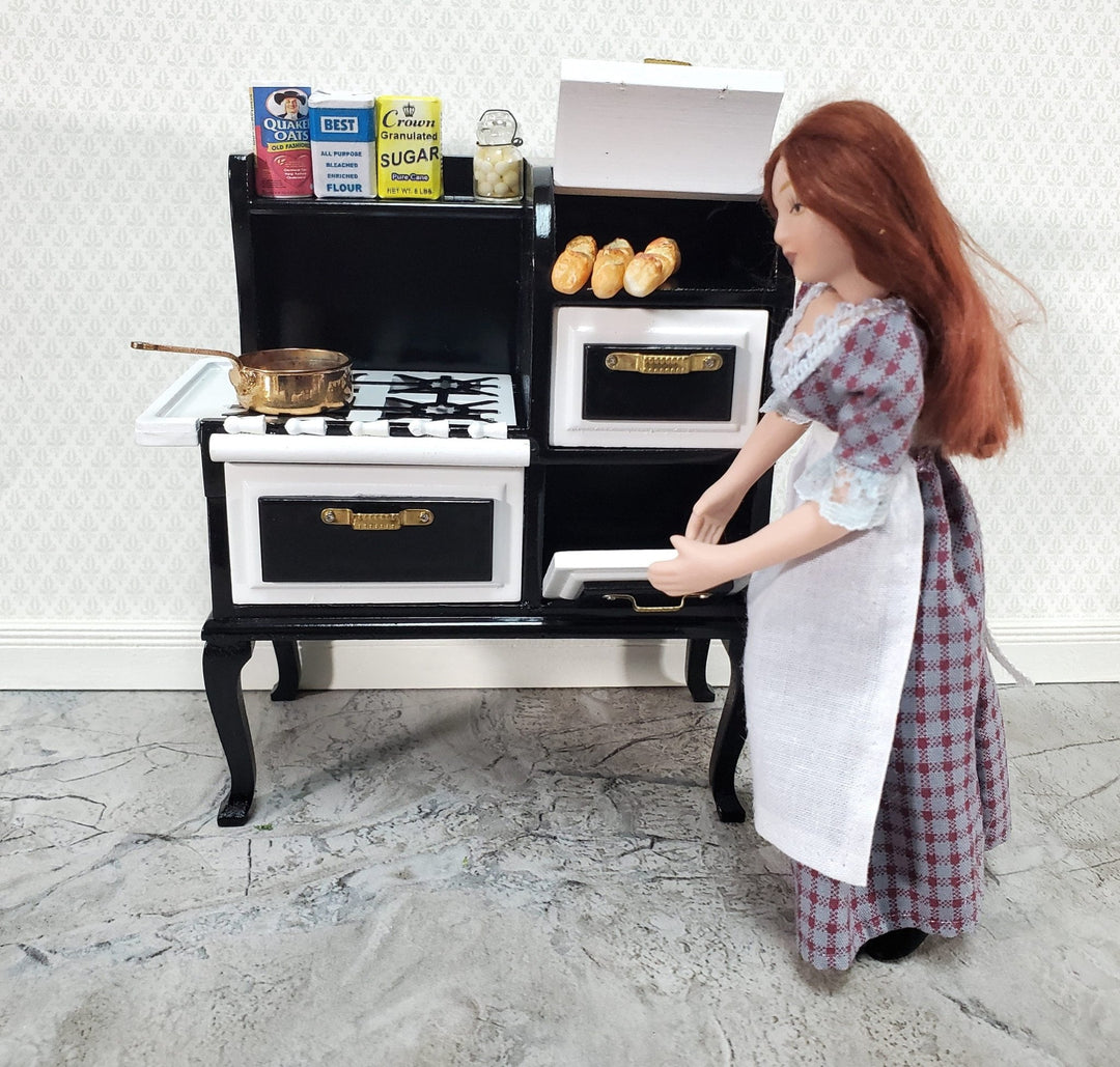 https://miniaturecrush.com/cdn/shop/products/dollhouse-kitchen-range-stove-oven-1920s-style-large-112-scale-miniature-black-409136.jpg?v=1686414520&width=1080