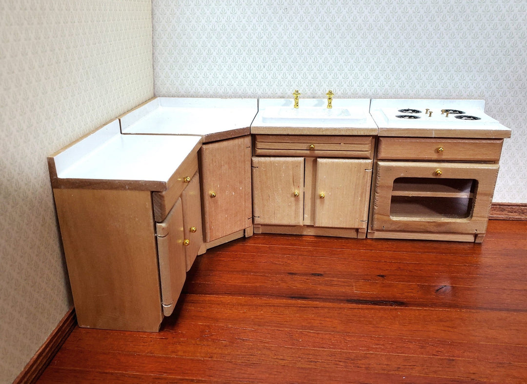 https://miniaturecrush.com/cdn/shop/products/dollhouse-kitchen-set-sink-stove-oven-cabinets-112-scale-miniature-furniture-330677.jpg?v=1686414525&width=1080