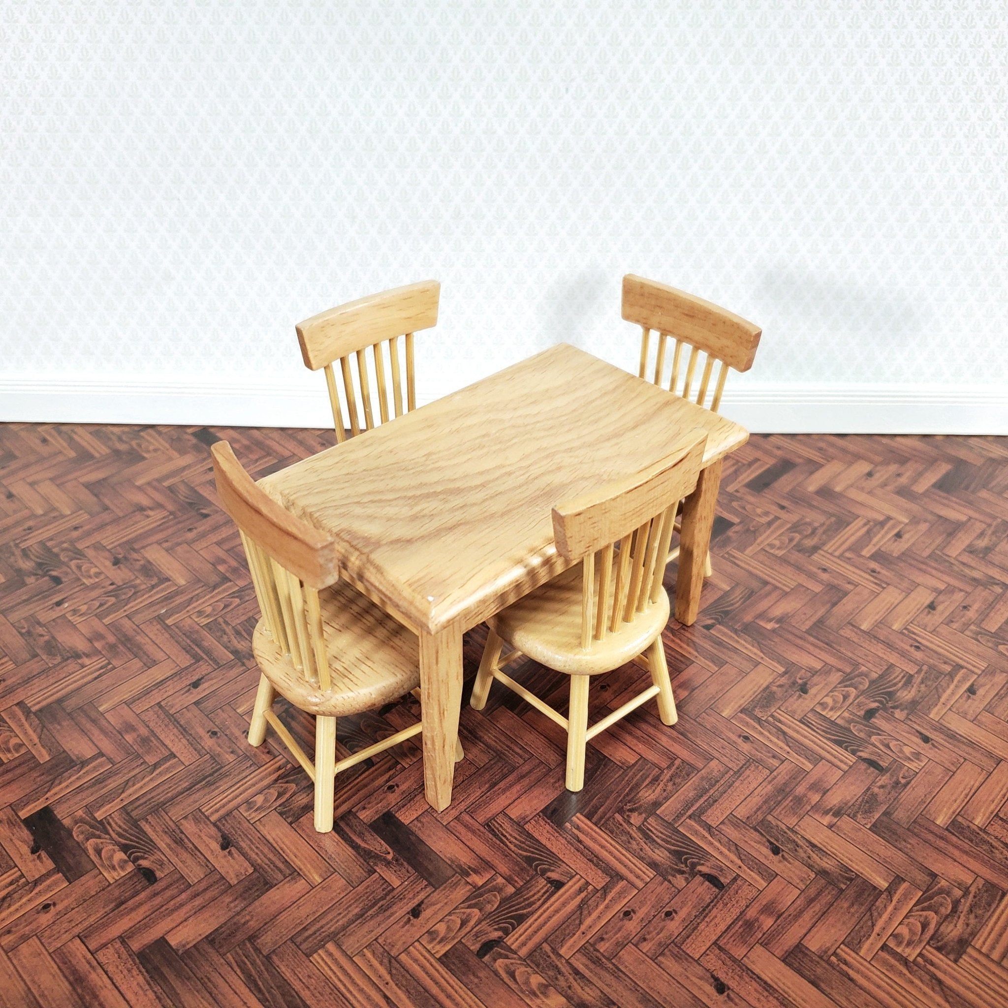 Medium oak dining discount table and chairs