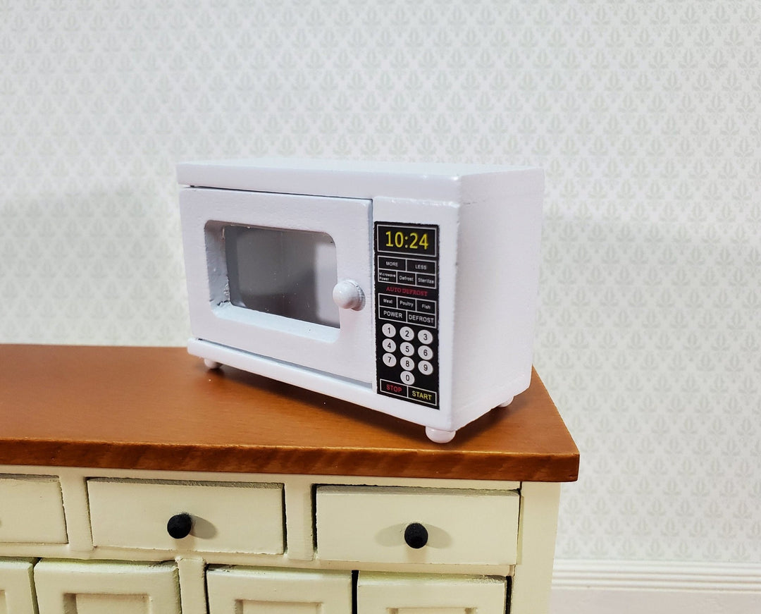https://miniaturecrush.com/cdn/shop/products/dollhouse-microwave-oven-modern-wood-with-opening-door-112-scale-kitchen-accessories-204986.jpg?v=1686414892&width=1080