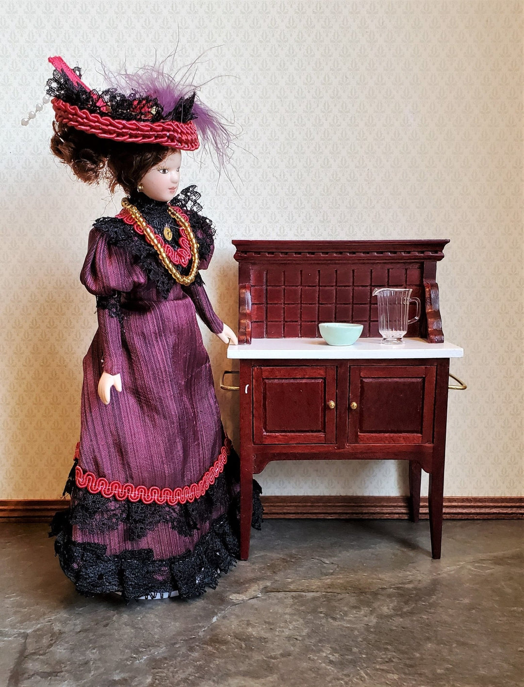 Dollhouse Miniature Victorian Doll Porcelain Fancy Maroon Dress and Hat 1:12 Scale - Miniature Crush