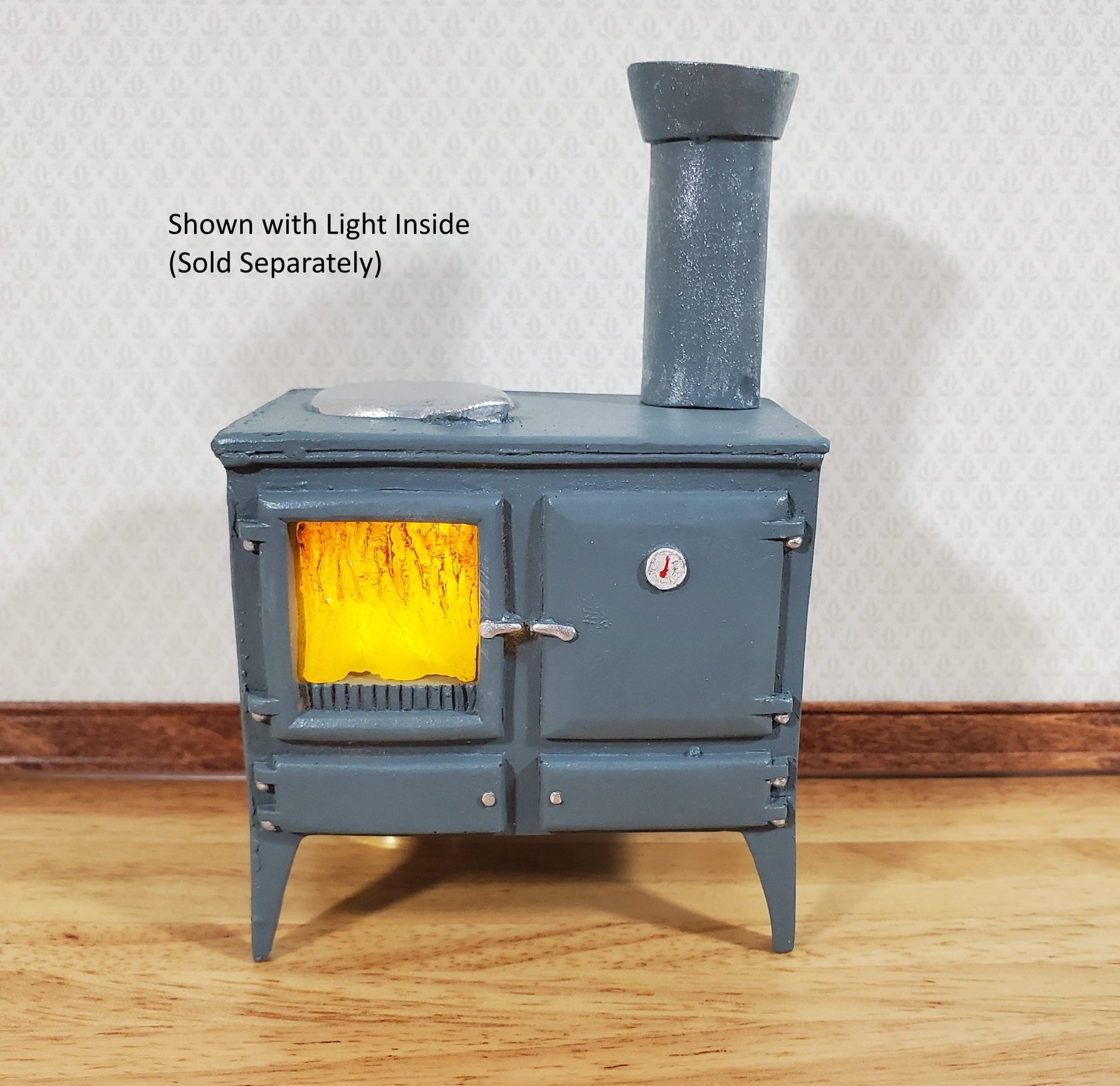 https://miniaturecrush.com/cdn/shop/products/dollhouse-wood-burning-stove-vintage-style-w-chimney-112-scale-hole-for-light-195014_1800x1800.jpg?v=1686419317