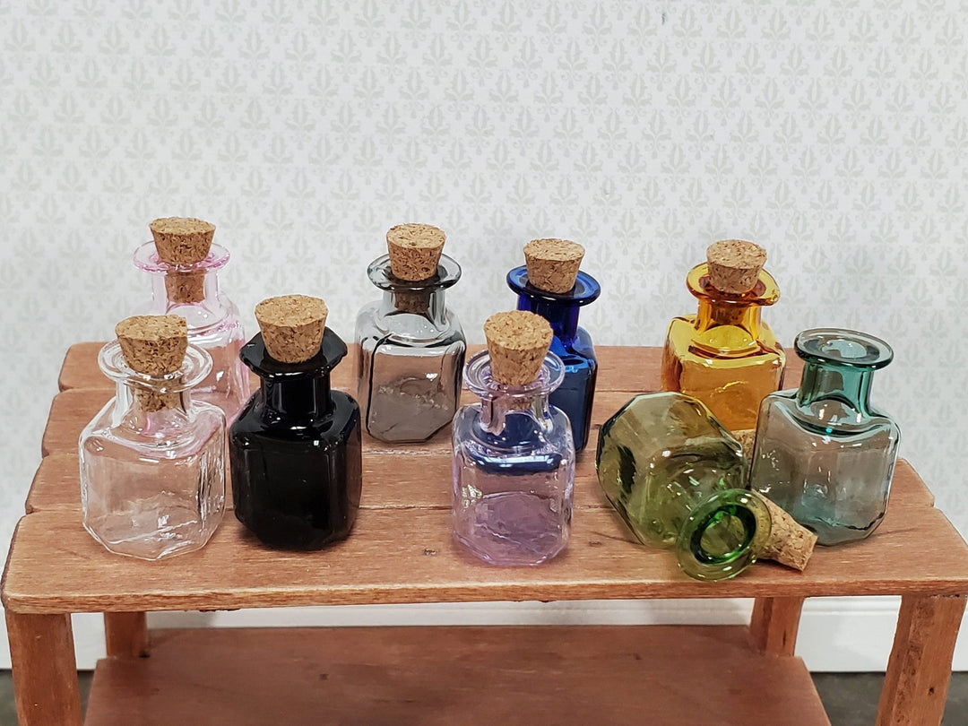 https://miniaturecrush.com/cdn/shop/products/miniature-glass-jars-bottles-cork-stoppers-x9-apothecary-square-bottom-1-tall-multiple-colors-321102.jpg?v=1686419963&width=1080
